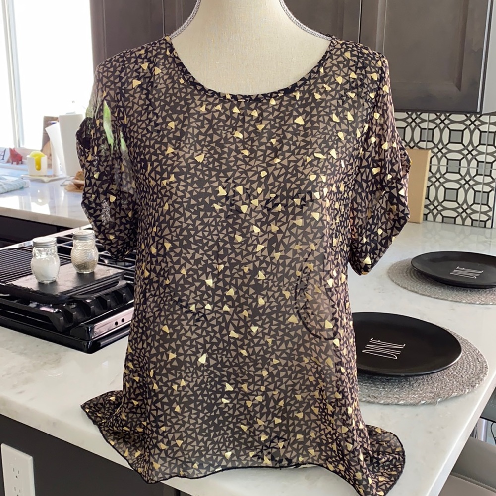Black and gold sheer top..
